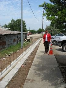 Carolyn McDowell, Friends President, with New Fence